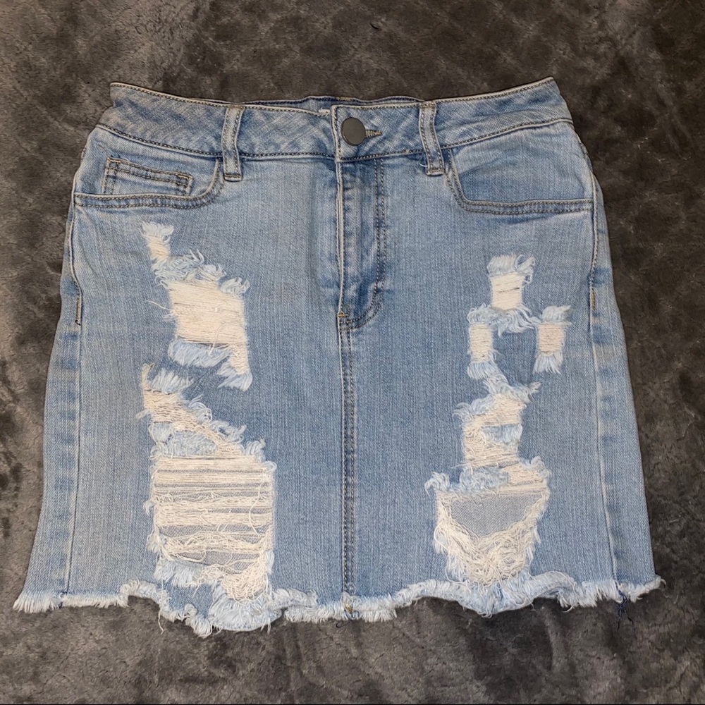 Fitted distressed jean skirt